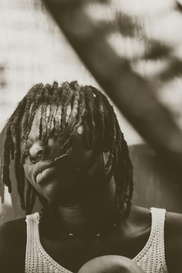 Black-and-white study of mature locs